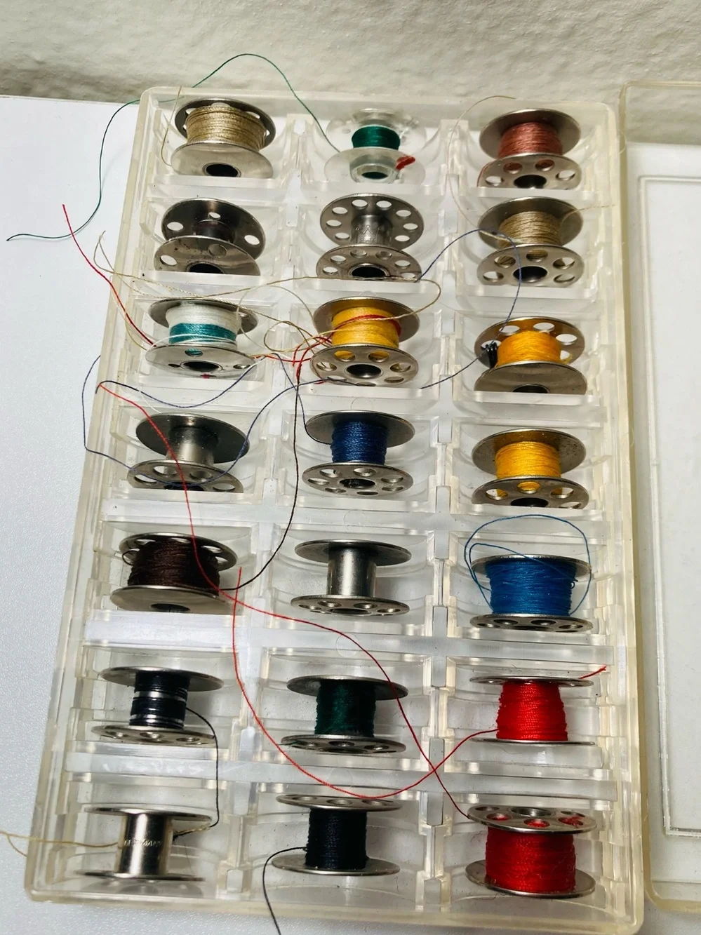 22 Vintage Metal Assorted Sewing Bobbins with Clear Storage Case